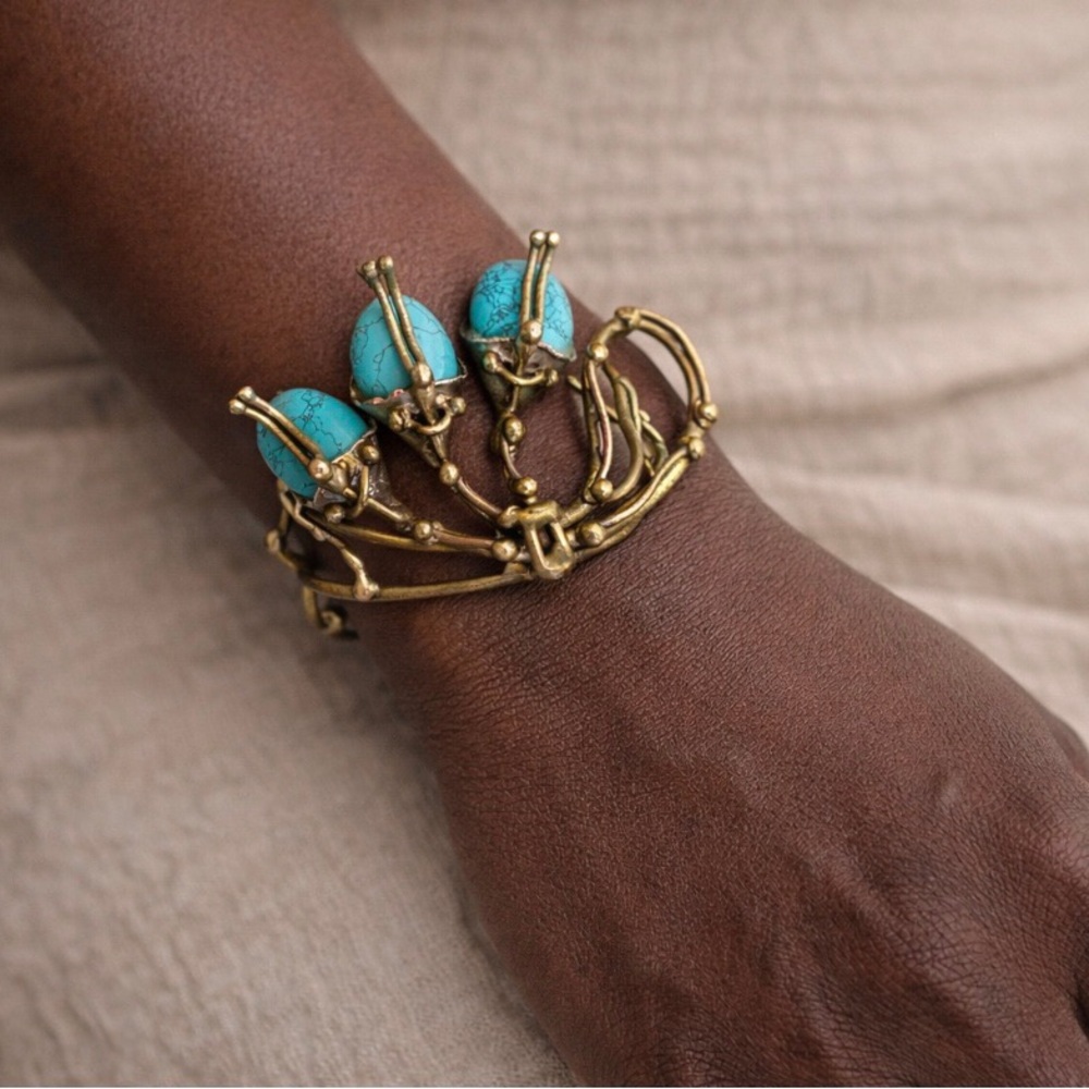 Vintage style turquoise colored stone gold tone bracelet, southwestern statement